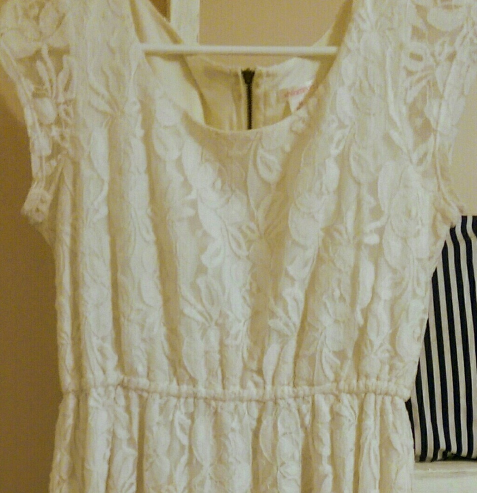 Good condition nice cream color dress.